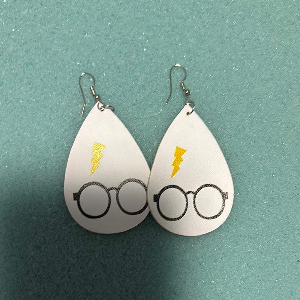 White Teardrop Earrings with Glasses and Lightning Bolt